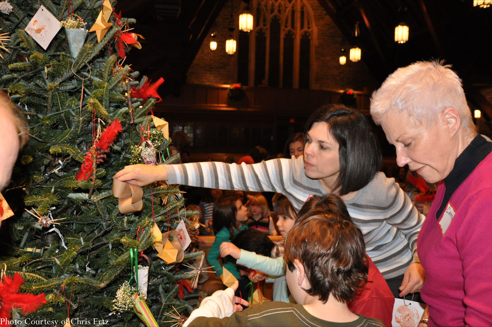 Decorating the tree in the sanctuary at Deck the Halls 2010